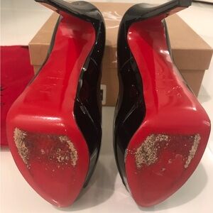 Christian Louboutin Black patent lady peep toe heel. Worn maybe twice.